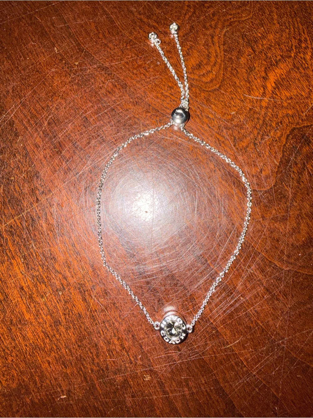 Coach Silver-Tone Bracelet with Clear Crystal Accent